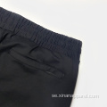 Partihandel herr elastiska midjeband nylon joggers sportbyxor